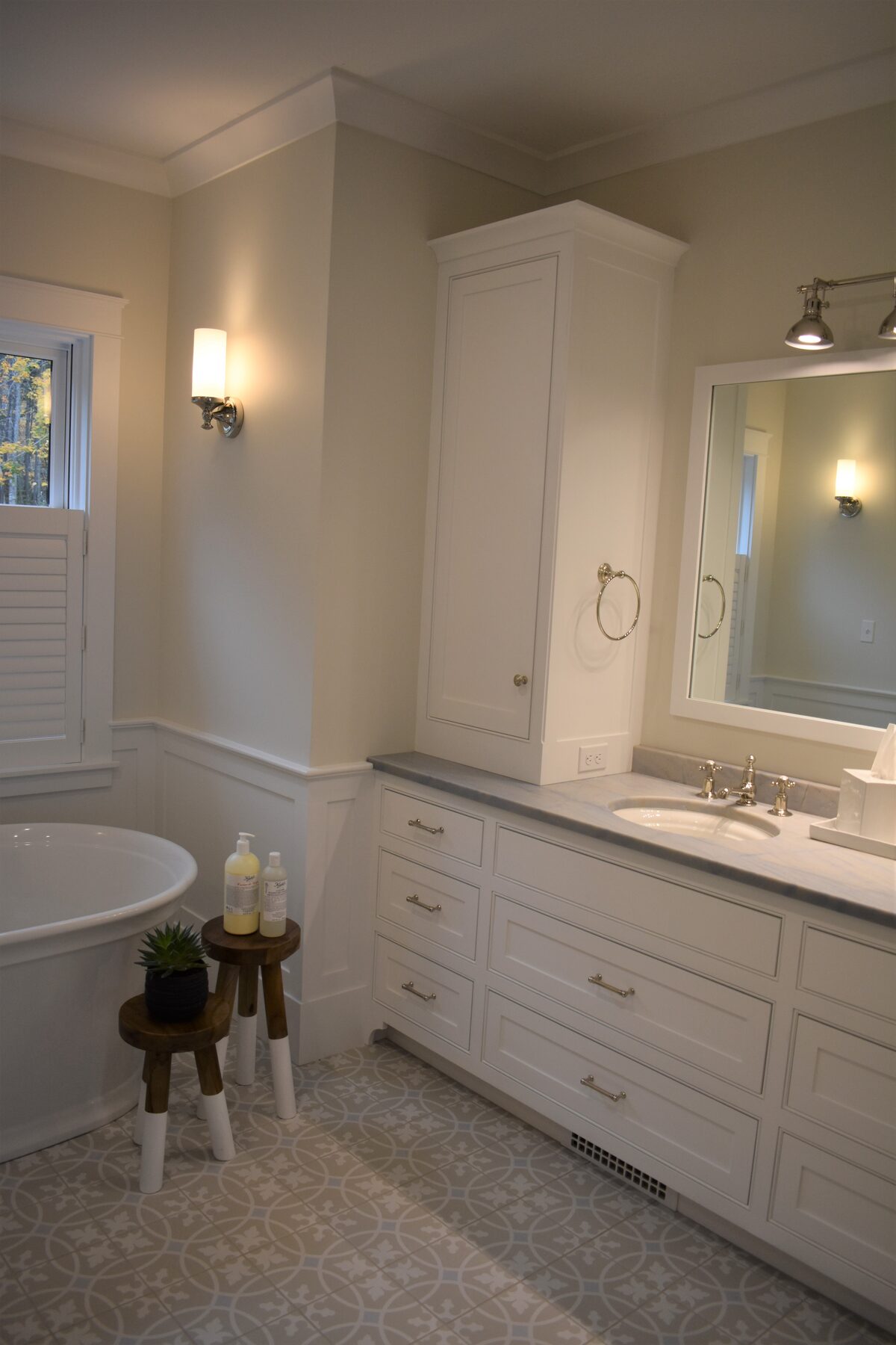 Bathroom vanity and tub room view