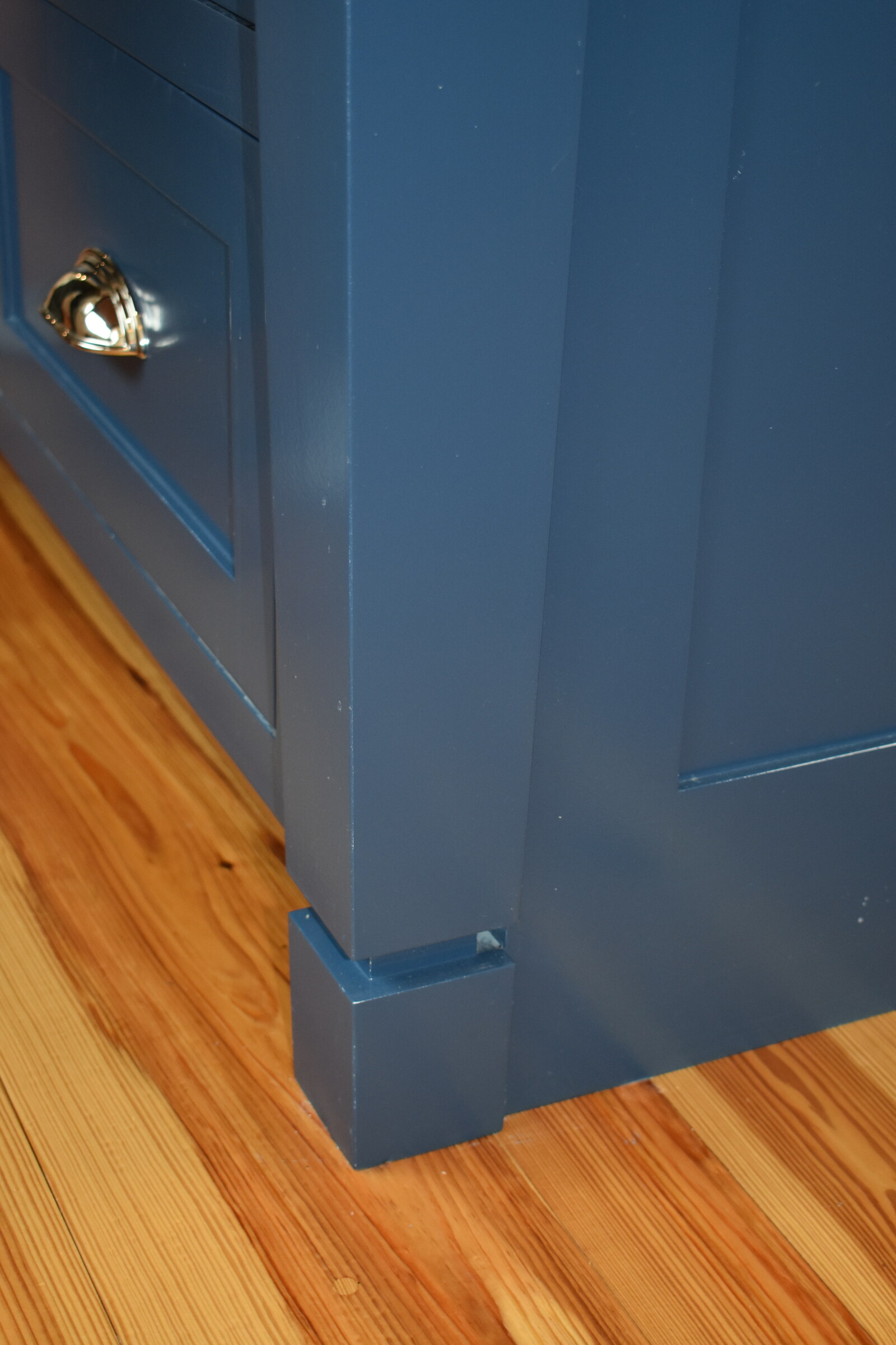 Blue cabinet base detail