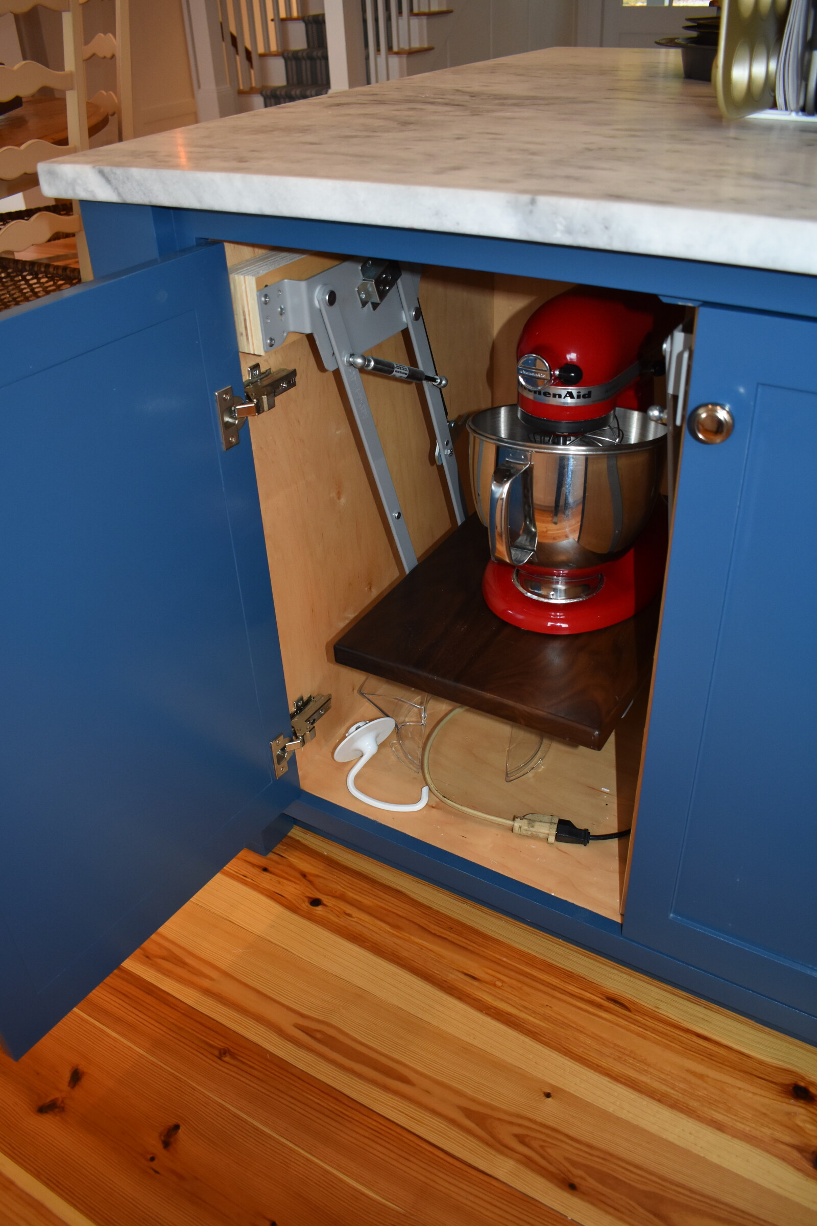 Blue cabinet mixer lift storage