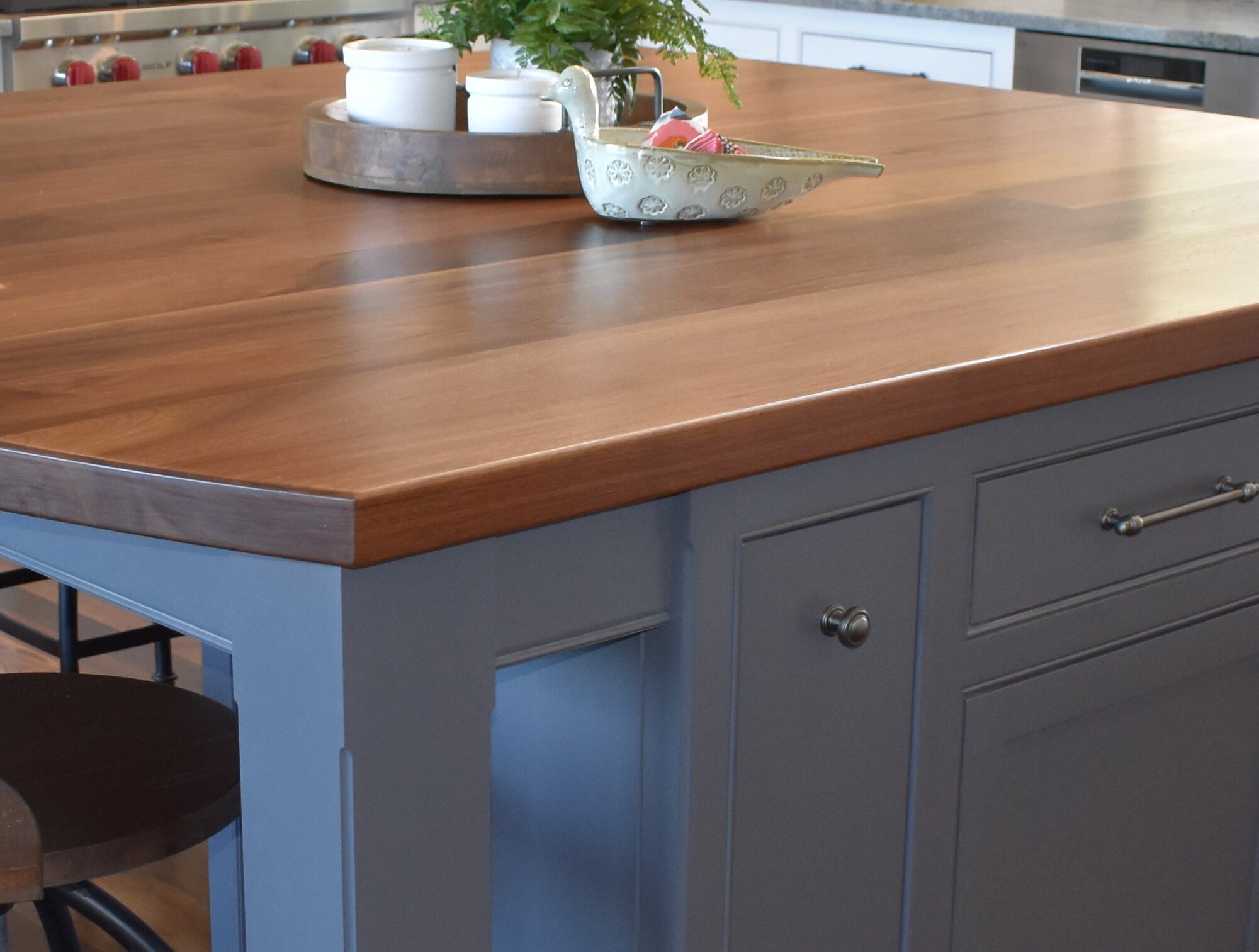 Blue kitchen island butcher block counter detail