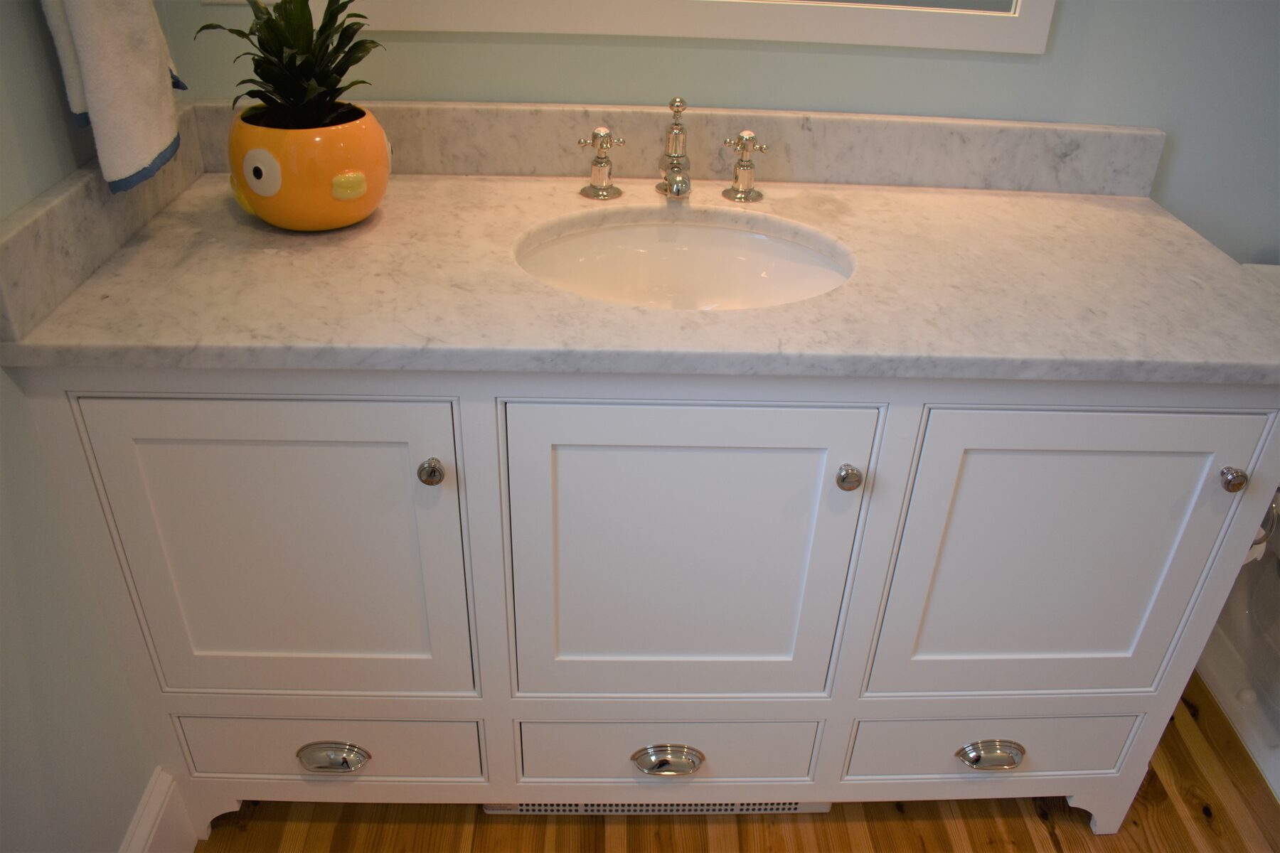 Built-in window seat with cushion and storage drawers