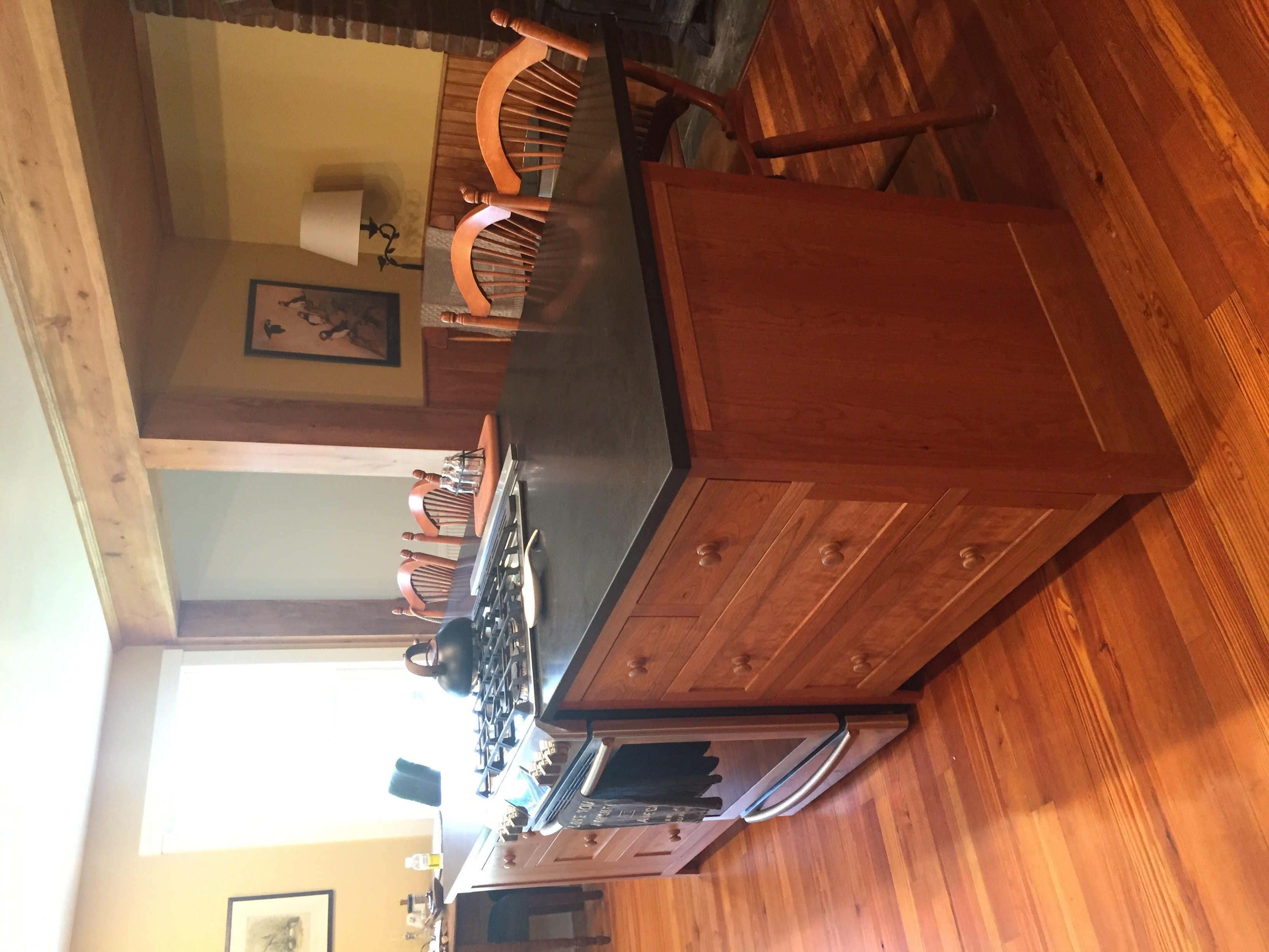 Cherry kitchen island and dining area