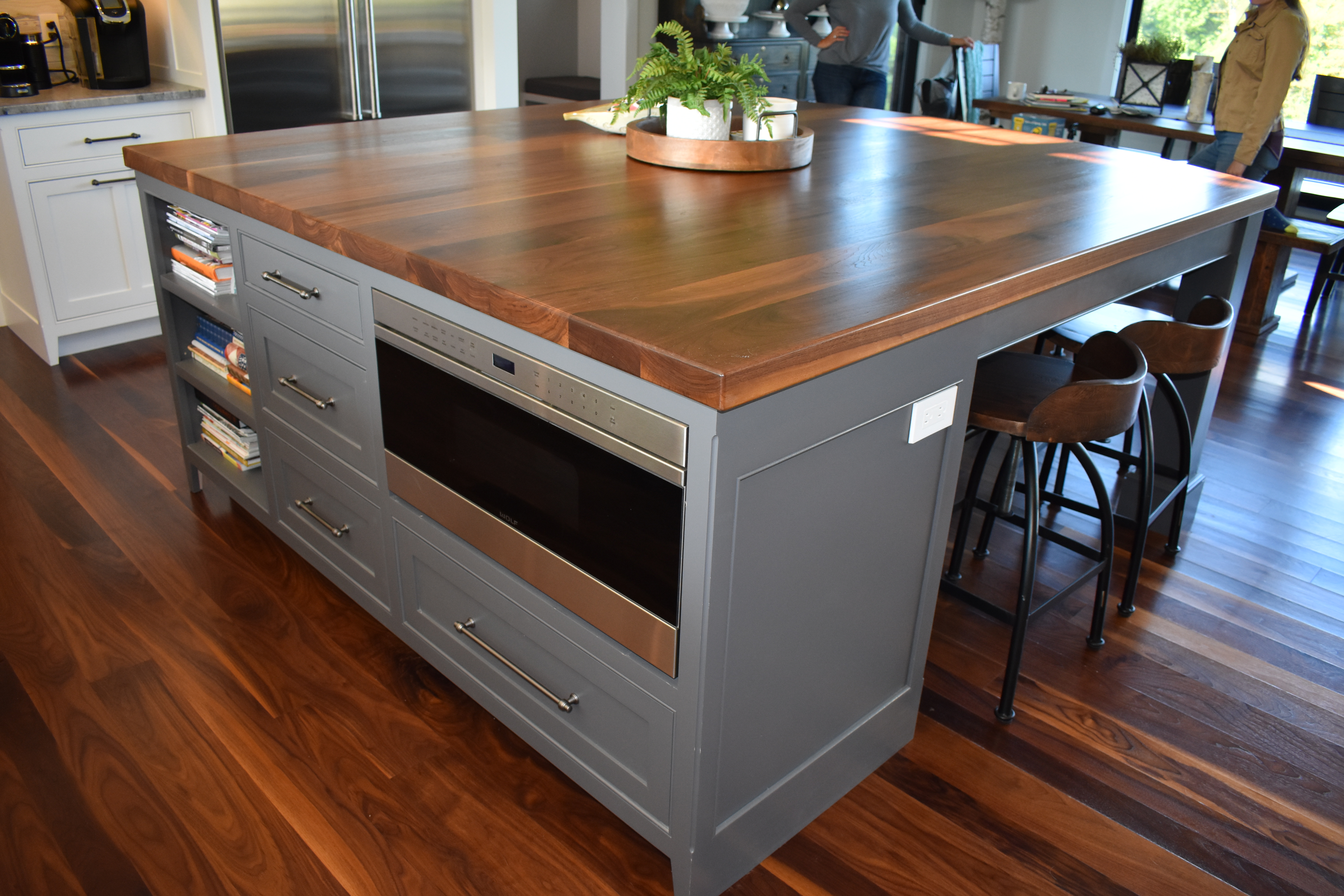 Custom gray kitchen island with wood countertop