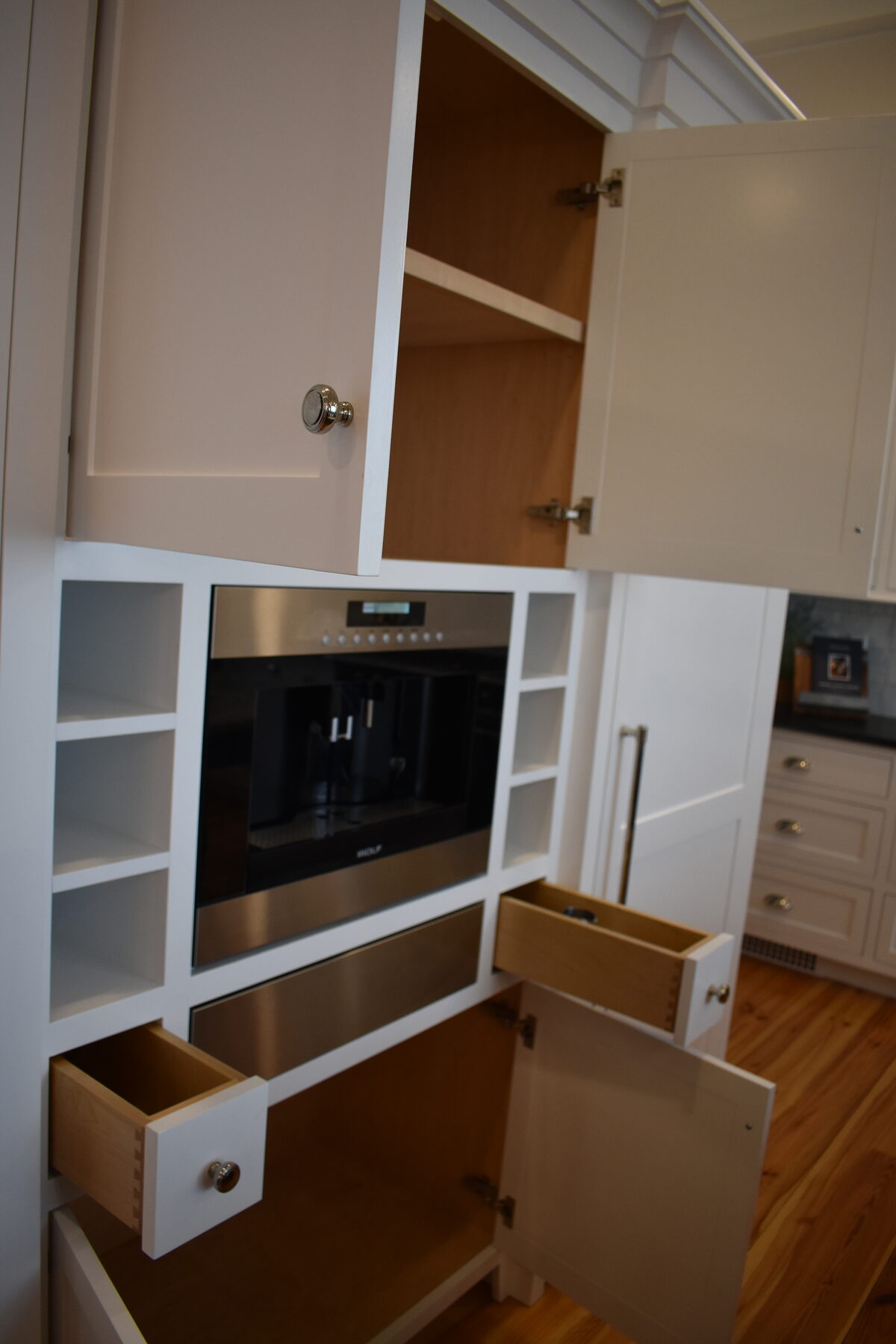 Kitchen range with custom pull-out storage