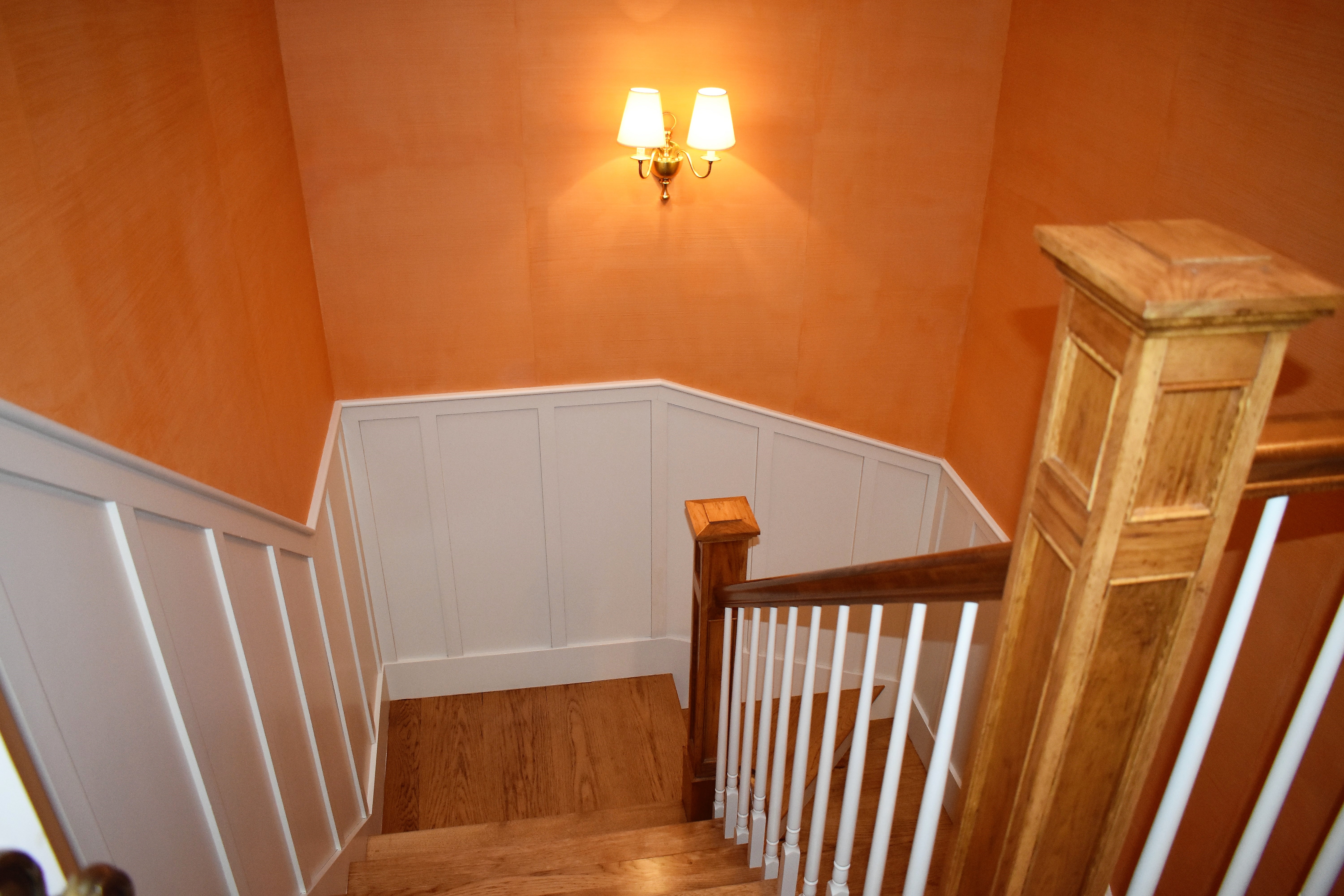 Stairway with custom wainscotting