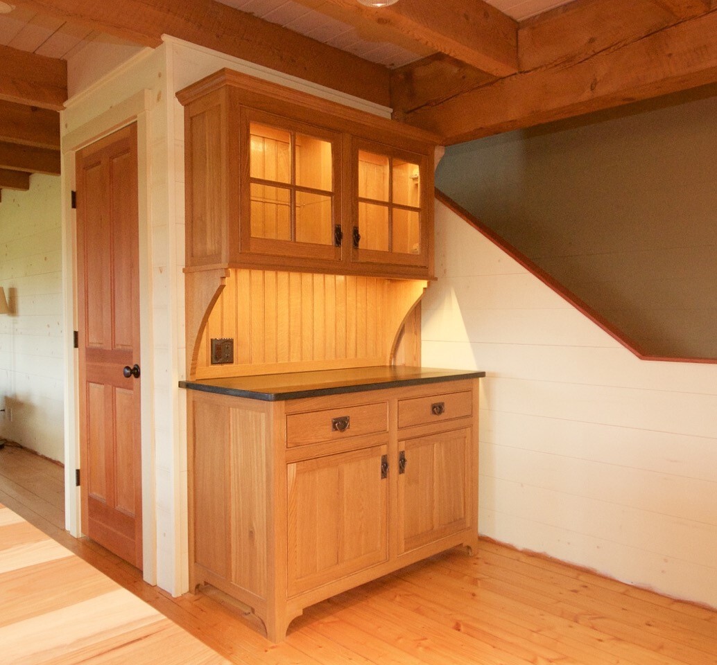 Natural wood hutch cabinet under stair