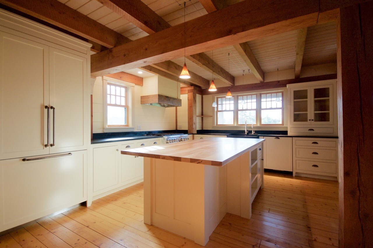 Natural wood kitchen with exposed beams
