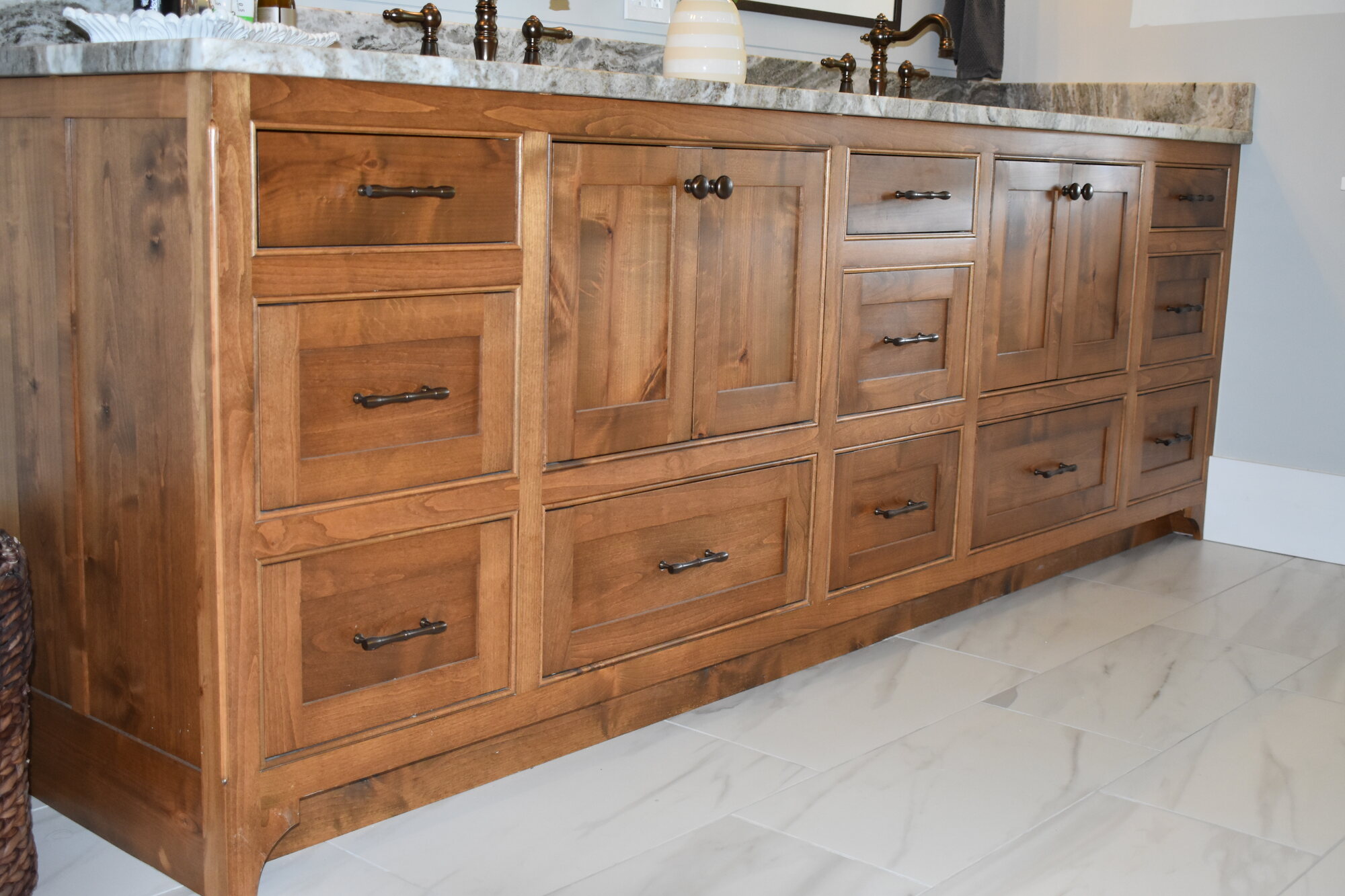 Natural wood vanity cabinetry detail