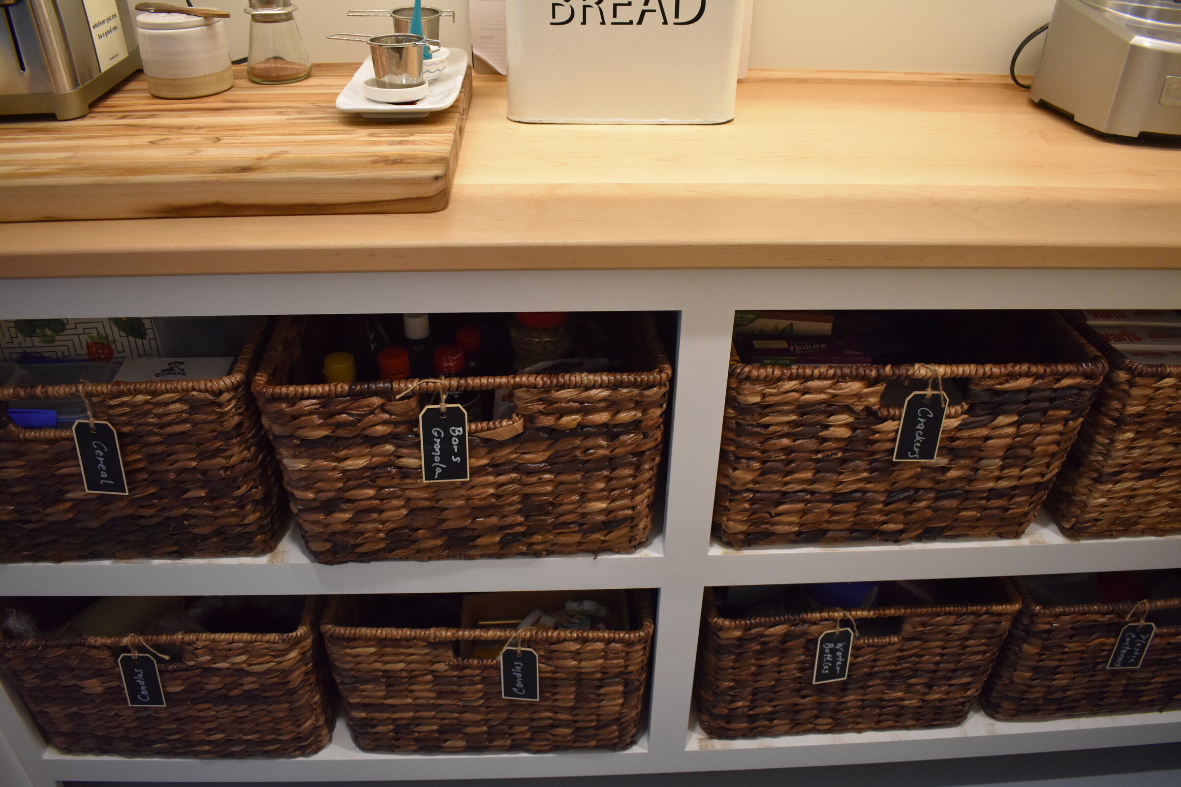 Custom pantry and blue cabinet storage