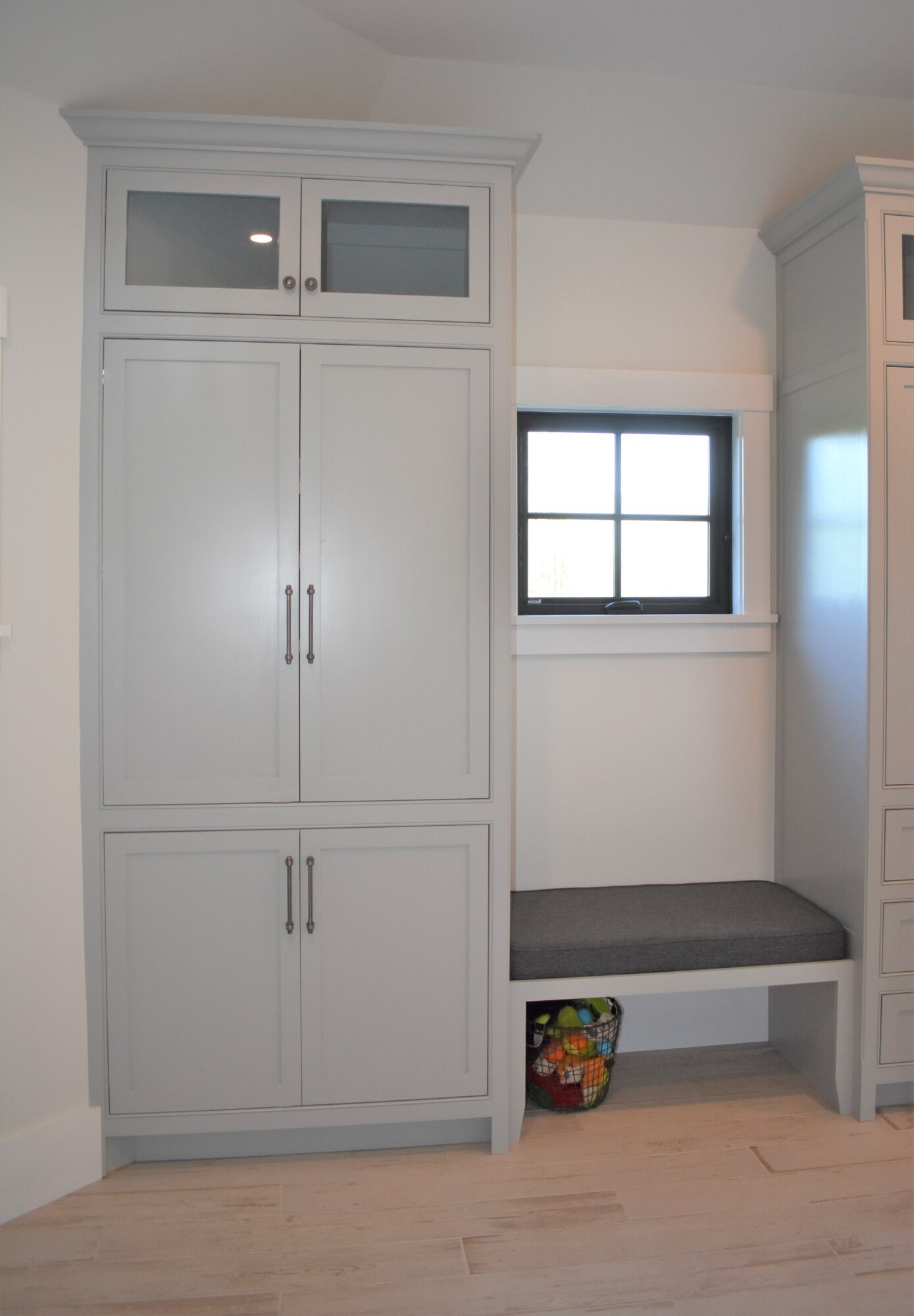White mudroom locker and bench cabinet
