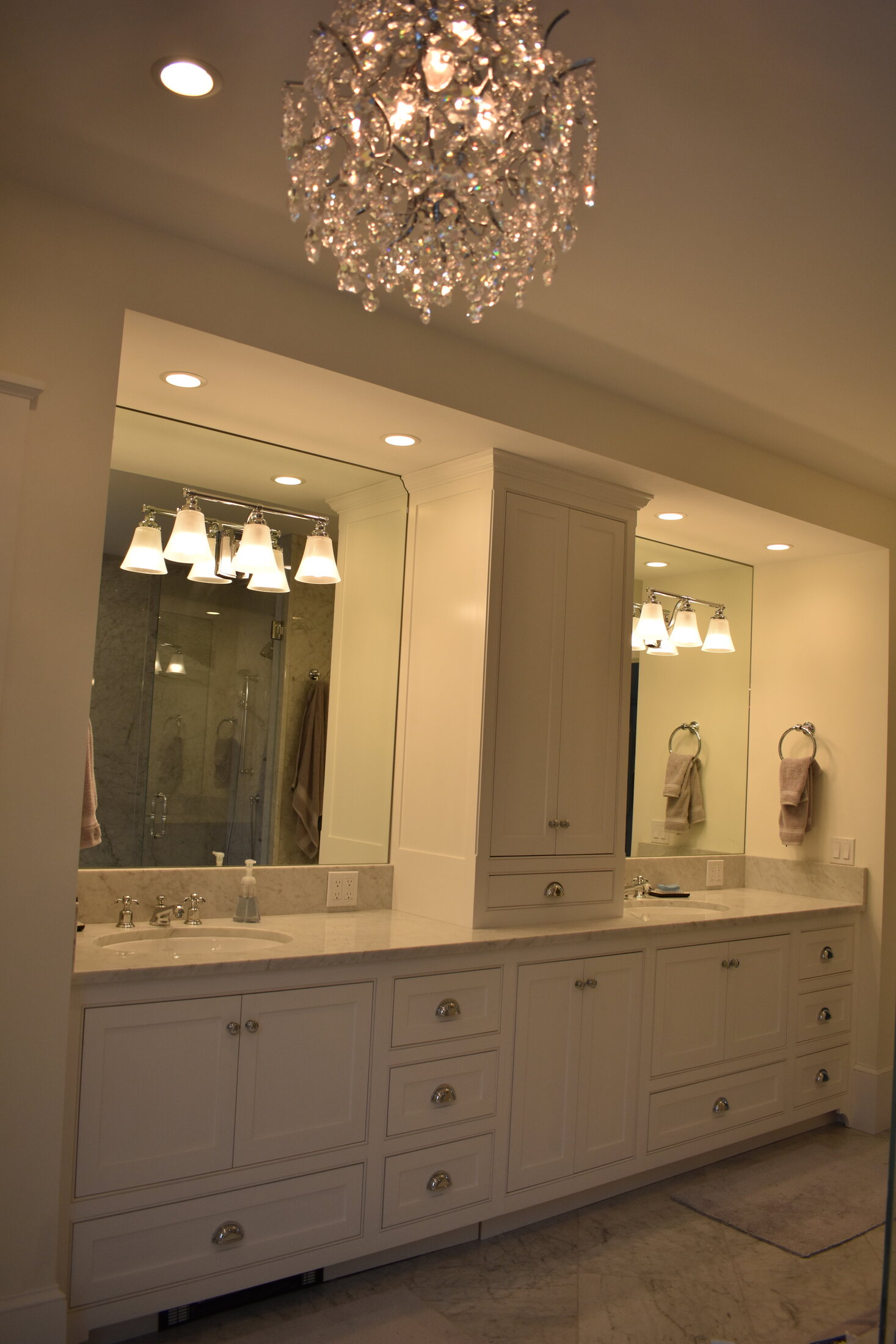 White double bathroom vanity with marble counter