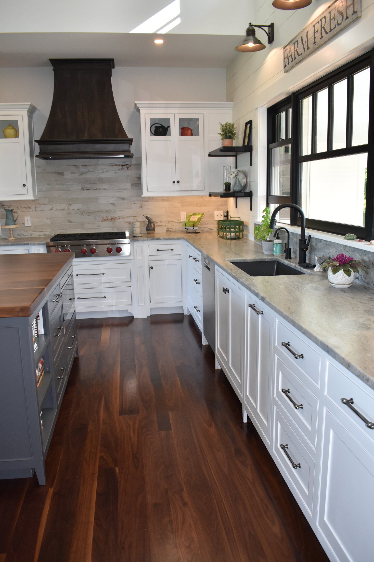 White kitchen with black windows