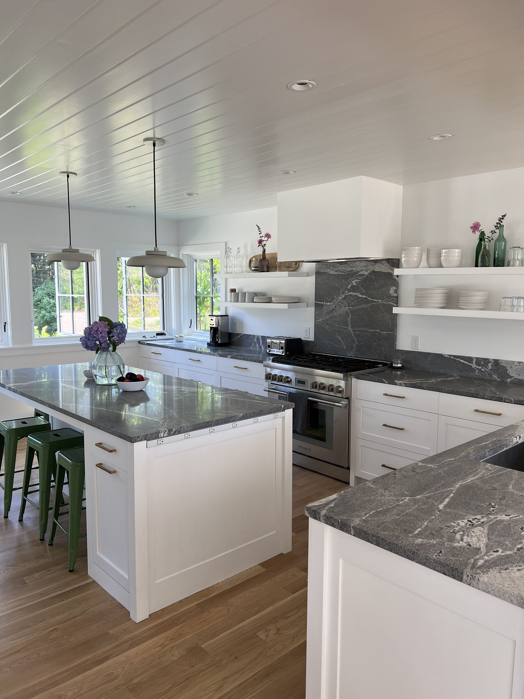 White kitchen sink wall cabinetry