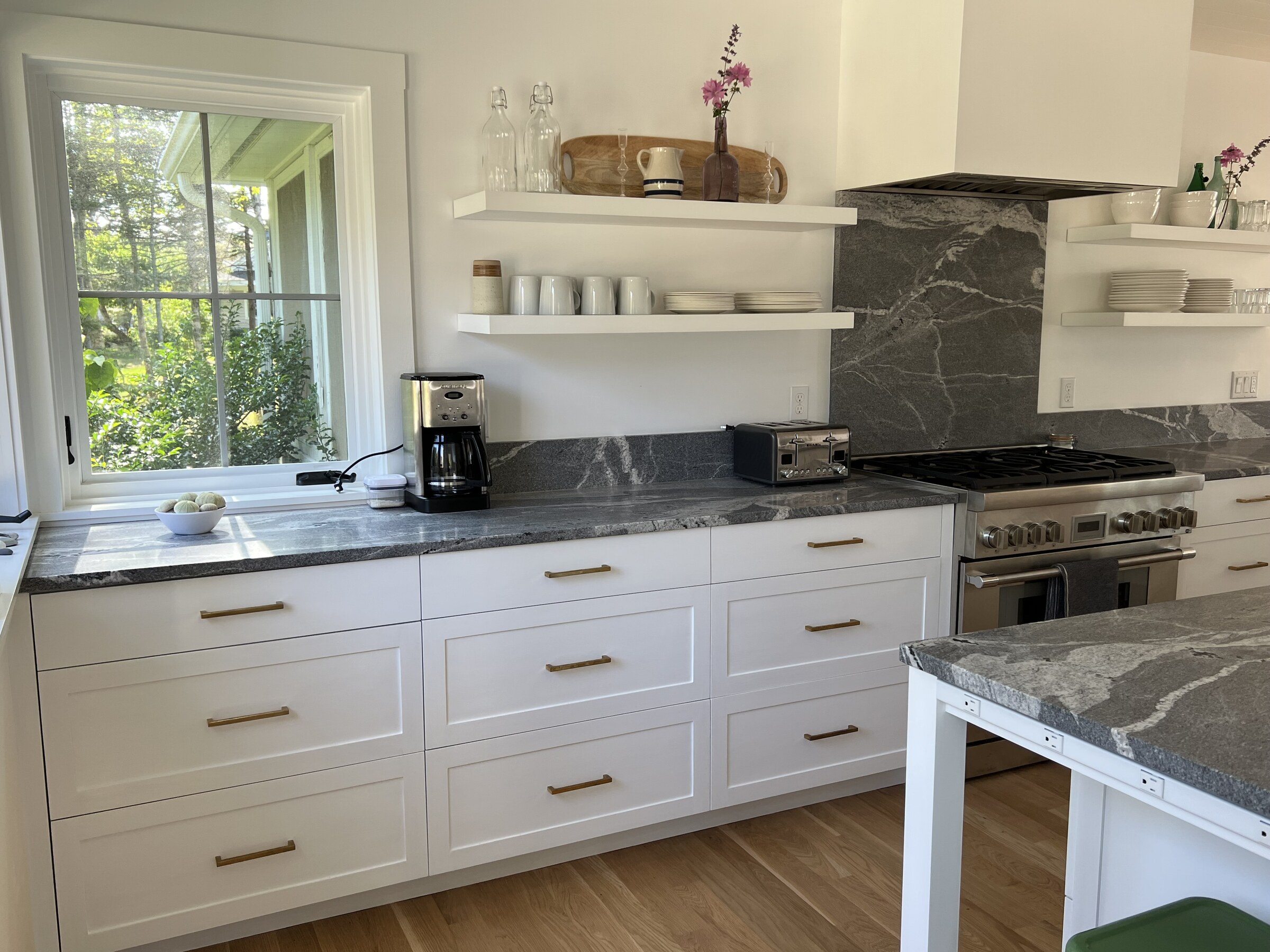 White kitchen appliance wall and island