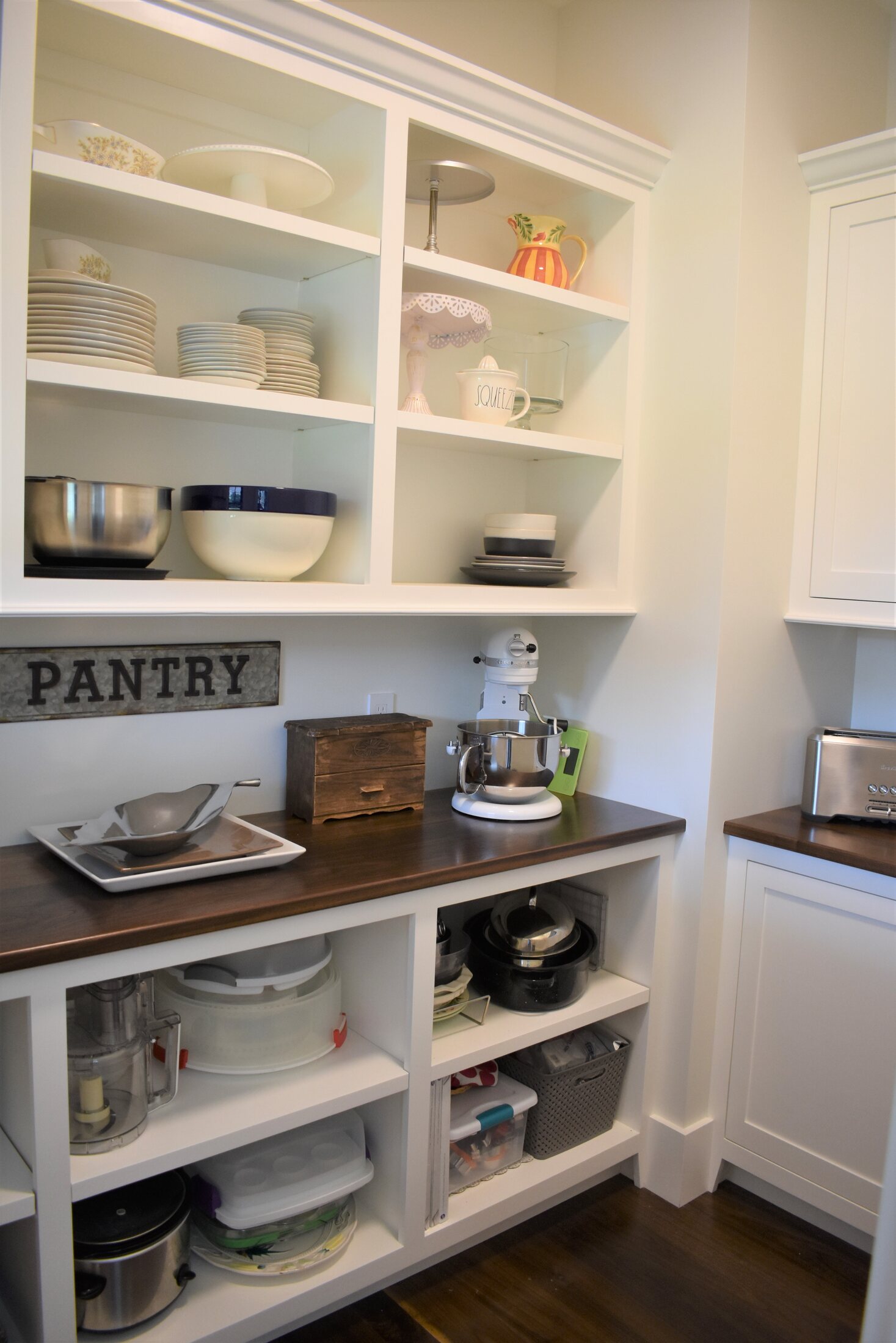 White kitchen pantry open shelving