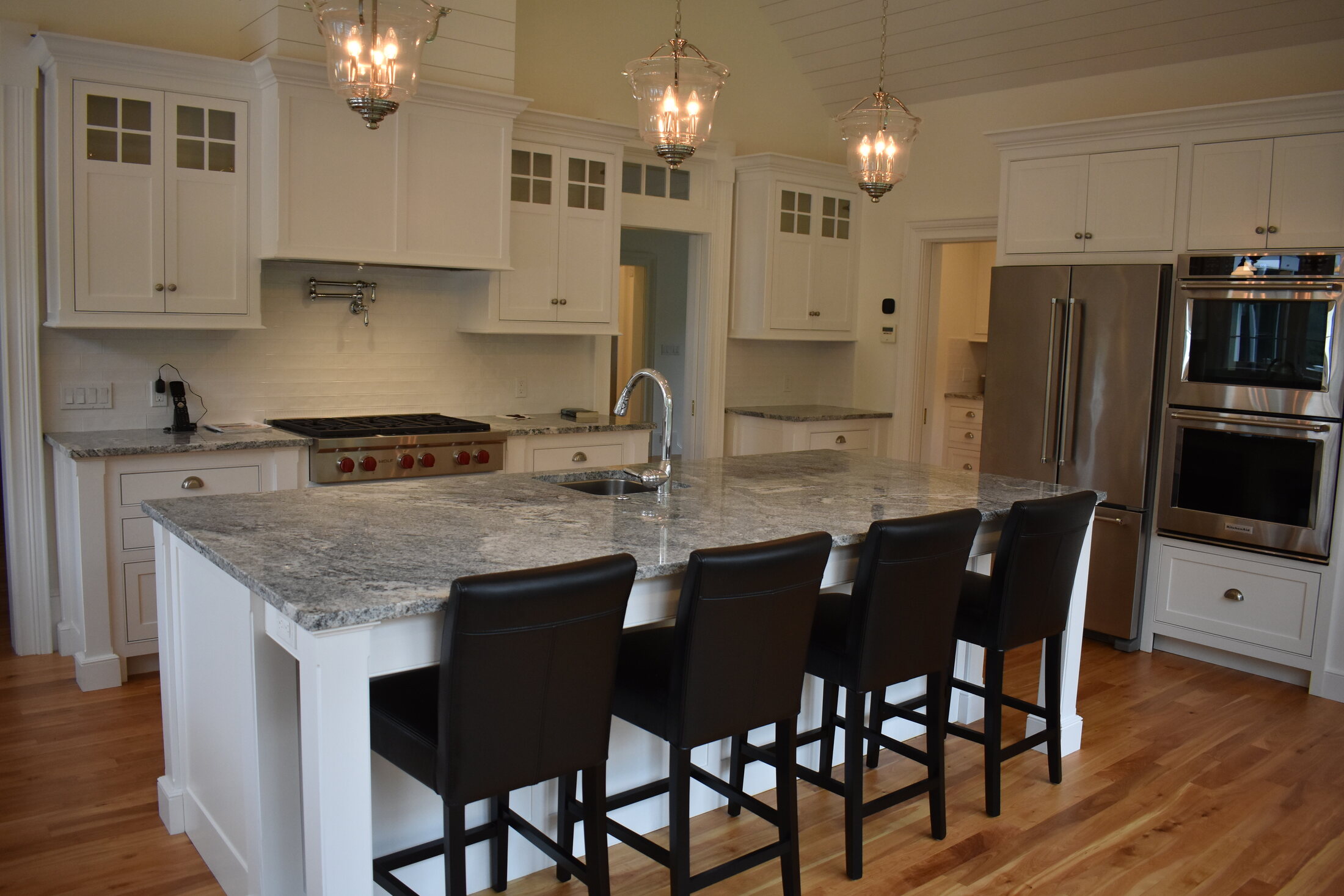White kitchen window and sink wall